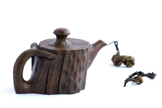 A close up view of Chinese ceramic teapot over white