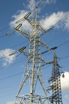 High-voltage electric support on the sky background