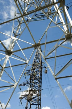 High-voltage electric support on the sky background