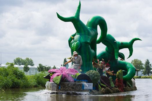 WESTLAND,THE NETHERLANDS - AUGUST 2009: Fabulous decorated boats in the spectacular annual Westland Floating Flower Parade August 02, 2010, Maasland, the Netherlands. 
