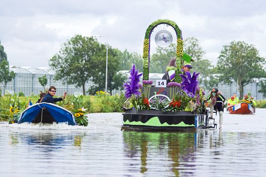 WESTLAND,THE NETHERLANDS - AUGUST 2009: Fabulous decorated boats in the spectacular annual Westland Floating Flower Parade August 02, 2010, Maasland, the Netherlands. 
