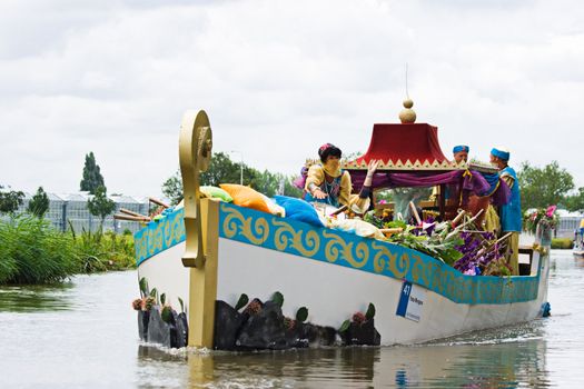 WESTLAND,THE NETHERLANDS - AUGUST 2009: Fabulous decorated boats in the spectacular annual Westland Floating Flower Parade August 02, 2010, Maasland, the Netherlands. 
