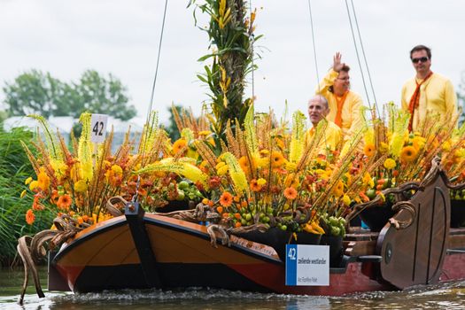 WESTLAND,THE NETHERLANDS - AUGUST 2009: Fabulous decorated boats in the spectacular annual Westland Floating Flower Parade August 02, 2010, Maasland, the Netherlands. 
