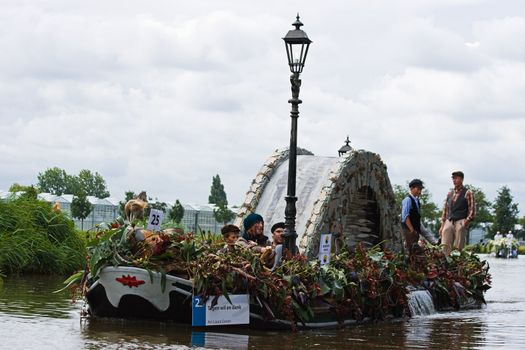 WESTLAND,THE NETHERLANDS - AUGUST 2009: Fabulous decorated boats in the spectacular annual Westland Floating Flower Parade August 02, 2010, Maasland, the Netherlands. 
