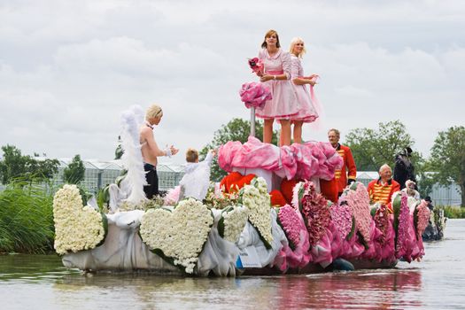 WESTLAND,THE NETHERLANDS - AUGUST 2009: Fabulous decorated boats in the spectacular annual Westland Floating Flower Parade August 02, 2010, Maasland, the Netherlands. 
