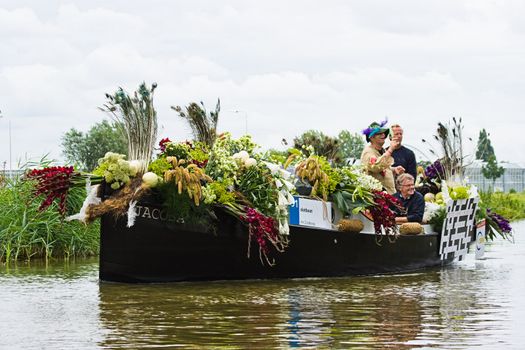 WESTLAND,THE NETHERLANDS - AUGUST 2009: Fabulous decorated boats in the spectacular annual Westland Floating Flower Parade August 02, 2010, Maasland, the Netherlands. 
