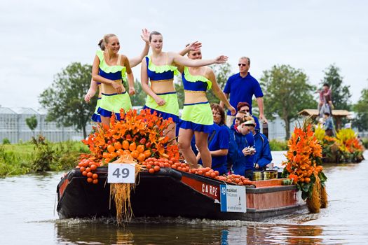 WESTLAND,THE NETHERLANDS - AUGUST 2009: Fabulous decorated boats in the spectacular annual Westland Floating Flower Parade August 02, 2010, Maasland, the Netherlands. 
