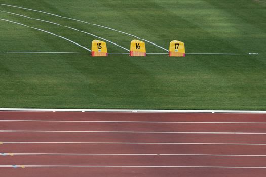 detail from empty athletics race track and field