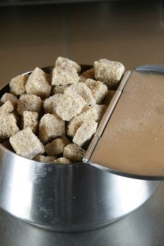 Sugar cubes in an aluminum container