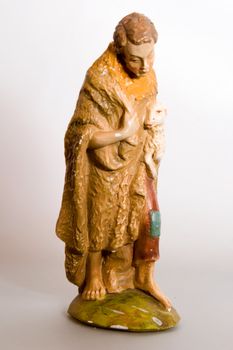 An antique shepherd nativity character.