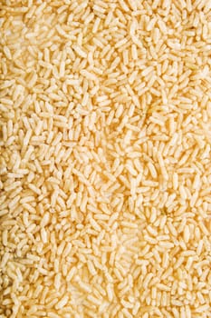 Bulk whole grain instant cooking rice background texture