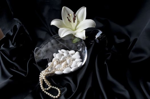
Jewelry and other precious stones on black background fabric