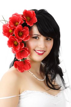 portrait of a beautiful young woman with fake flowers on hair