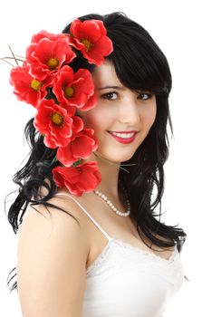 beautiful young woman with red fake flowers