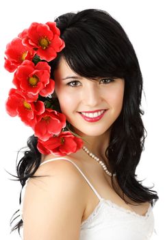 beautiful young woman with red fake flowers