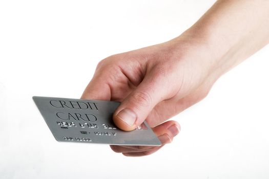 Paying with a credit card, over a white background
