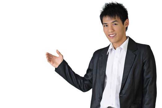 Portrait of a happy business man of Asian showing something on white background.