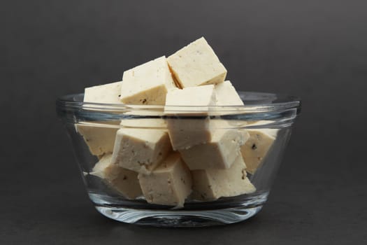 cube of fresh fine herbs tofu in a bowl