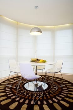 Modern interior with dining table