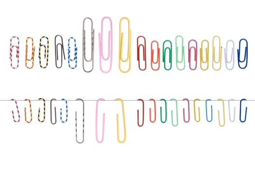 Collection of paper clips on isolated white background