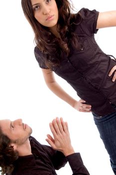 man begging in front of woman with white background