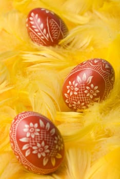 Three handmade easter eggs - selective focus on the second one.