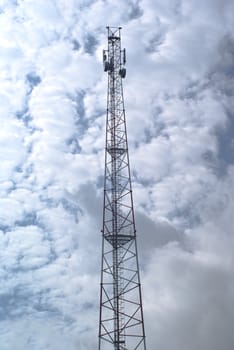 Broadcasting tower is on the background of sky.