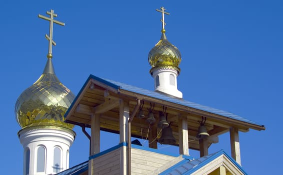 Church domes in the dark blue sky