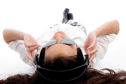 beautiful american woman with headphone on an isolated white background