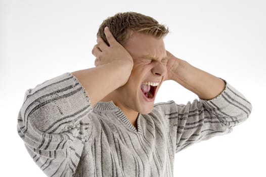 man shouting loudly on an isolated background