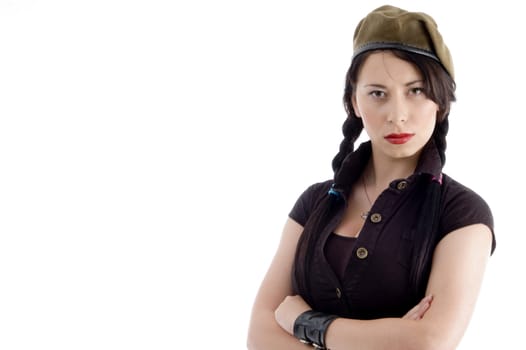 attractive young female posing with her arms crossed with white background