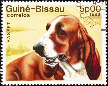 Guine-Bissau postage stamp featuring a basset dog.