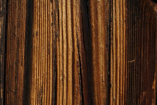 Wood detail - old rough, board background with clear wood grain.