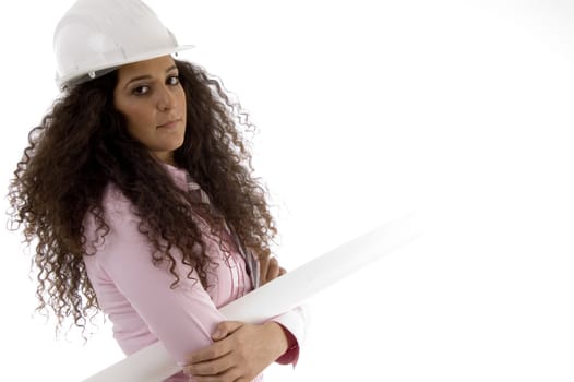 beautiful young architect posing with arms crossed on an isolated background