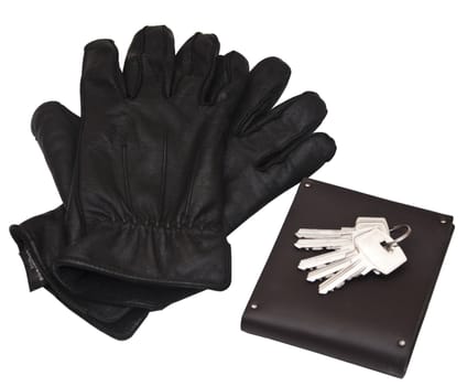Black man's gloves with purse and keys