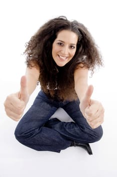 beautiful woman showing thumbs up on an isolated background