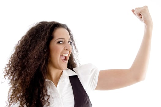 happy female showing her muscles against white background