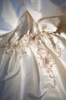 a part of a luxury dress