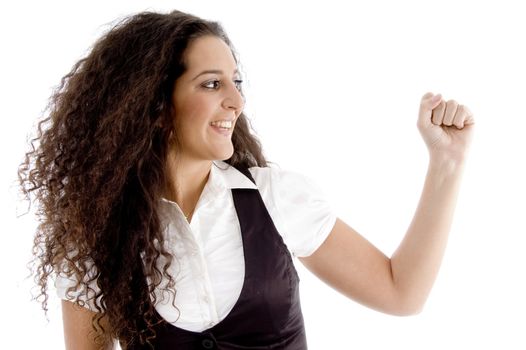 beautiful woman showing fist on an isolated white background