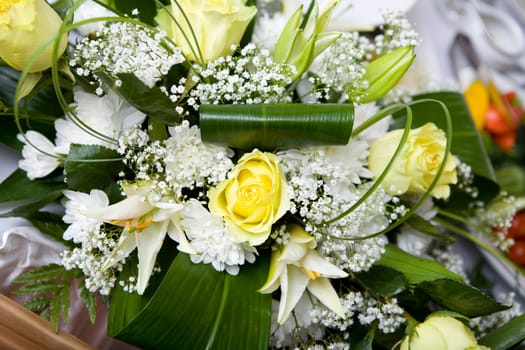 macro bouquet of flowers and yellow roses