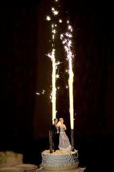 figurines on the wedding cake