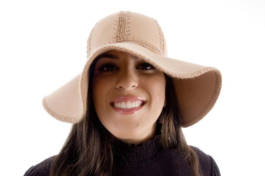 portrait of pretty woman wearing hat on an isolated background