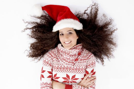 laying female with christmas hat with white background