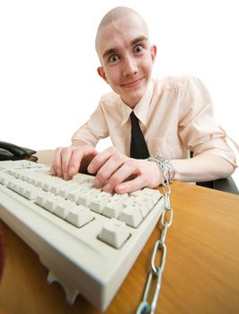 Man riveted chain to keyboard on the white background