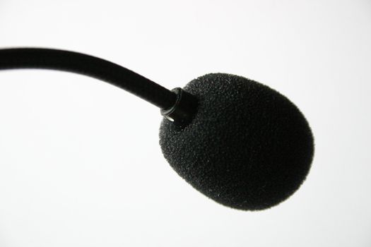close up of a headset micro on white background