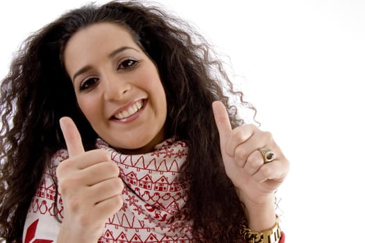 young woman showing thumb up with both hands on an isolated background