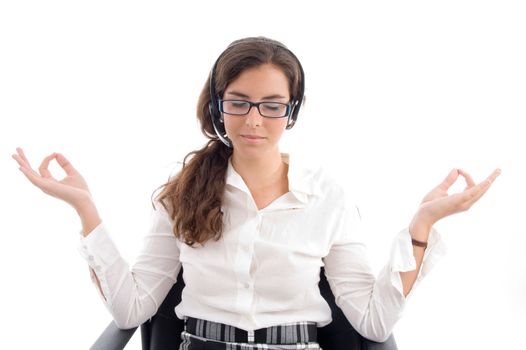 pretty woman doing meditation against white background