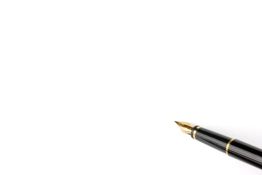 Exclussive pen with golden nib - white copy space for text etc.