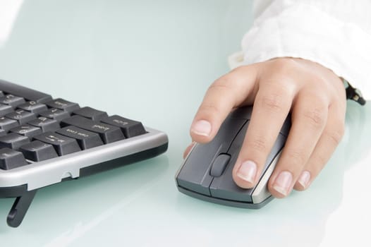 mouse in woman's hand on an isolated background