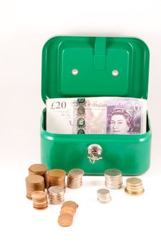 Savings box with UK cash.